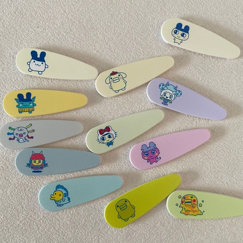 Hair Bundles - Schattige cartoon Tamagotchi elektronische huisdier decoratieve